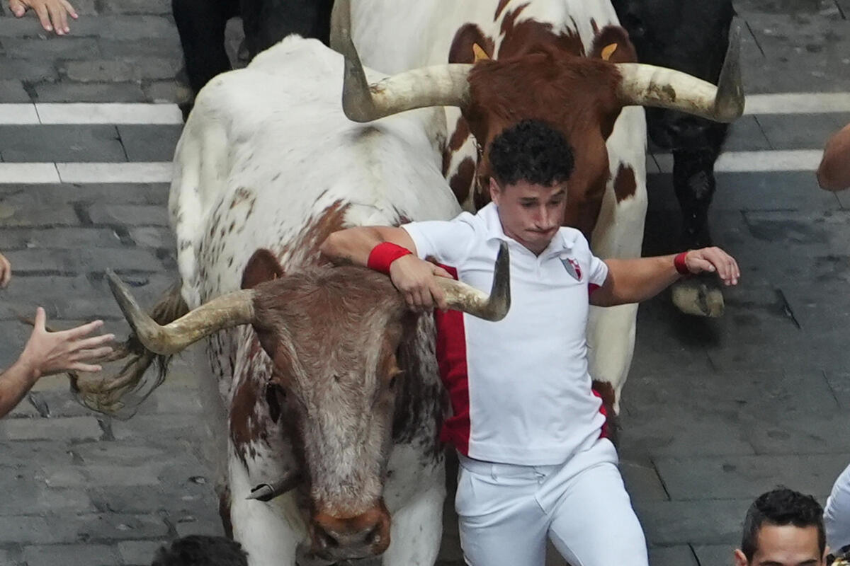 Cuarto encierro de los Sanfermines  / EFE