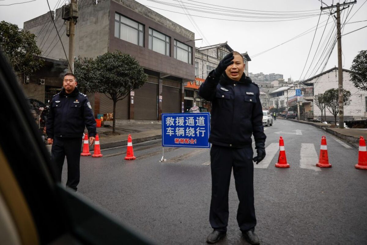 At least 20 dead and 24 missing after landslide in southwestern China  / MARK R. CRISTINO